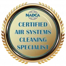 A round gold badge with a laurel border features the NADCA logo at the top. Below, the text reads “CERTIFIED AIR SYSTEMS CLEANING SPECIALIST” in blue font, highlighting expertise in duct cleaning for services near me.